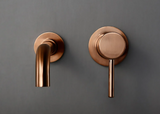Robinet mural pour lavabo en laiton finition or rosé avec double commande