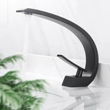 Robinet de lavabo incurvé moderne en laiton avec mitigeur eau chaude et froide