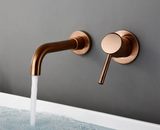 Robinet mural pour lavabo en laiton finition or rosé avec double commande