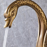 Robinet de lavabo en laiton avec bec en forme de cygne et effet cascade